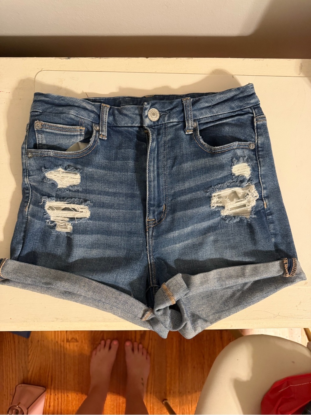 American Eagle High-Rise Distressed Denim Shorts in Blue